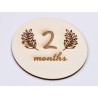 L637-Decoratiune cerc lemn "2 month" 13cm- 1 buc